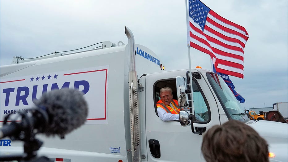 Trump hits Wisconsin in garbage truck 'in honor of Kamala and Joe Biden'