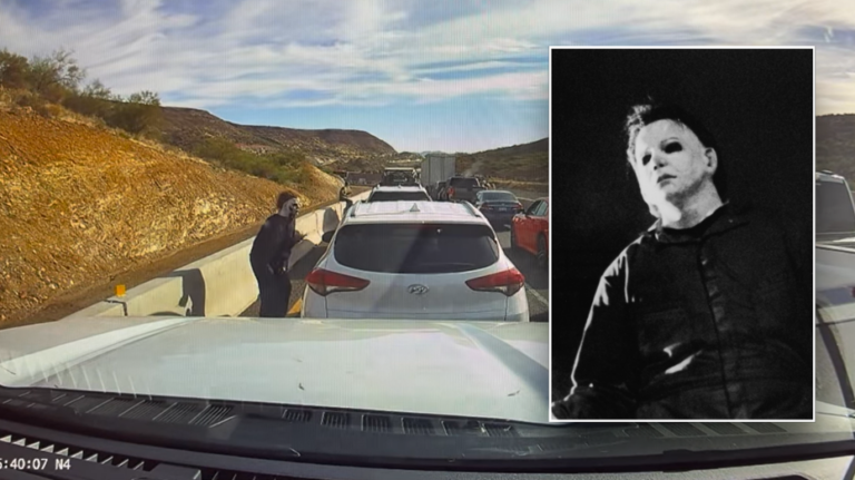 Man dressed up as iconic Halloween villain scares drivers in standstill traffic: video