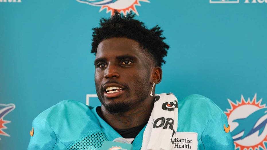 Dolphins' Tyreek Hill floats latest theory about arrest near NFL stadium amid battle with wrist injury