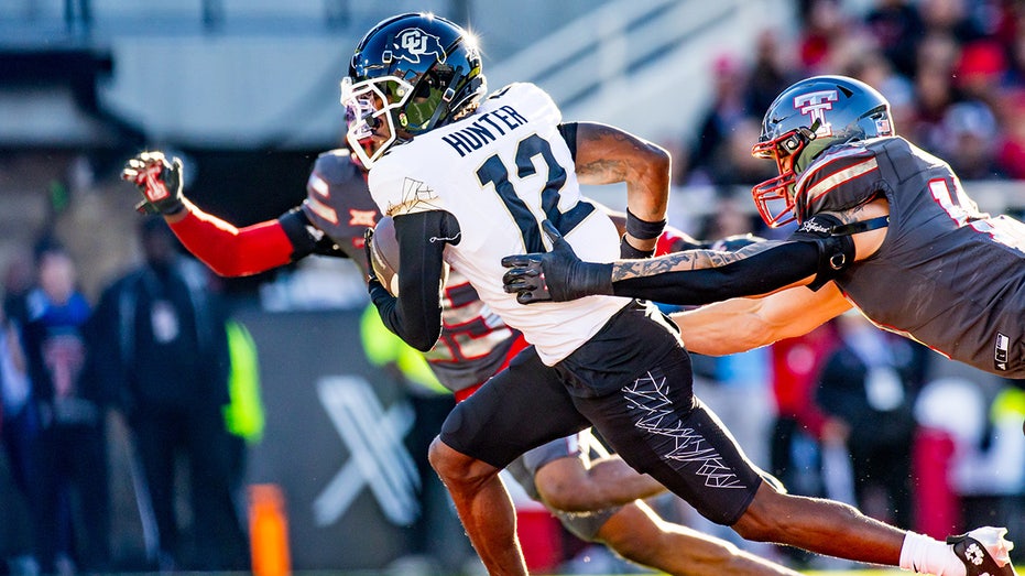 No. 20 Colorado stays alive for College Football Playoff as Heisman hopeful Travis Hunter continues dominance