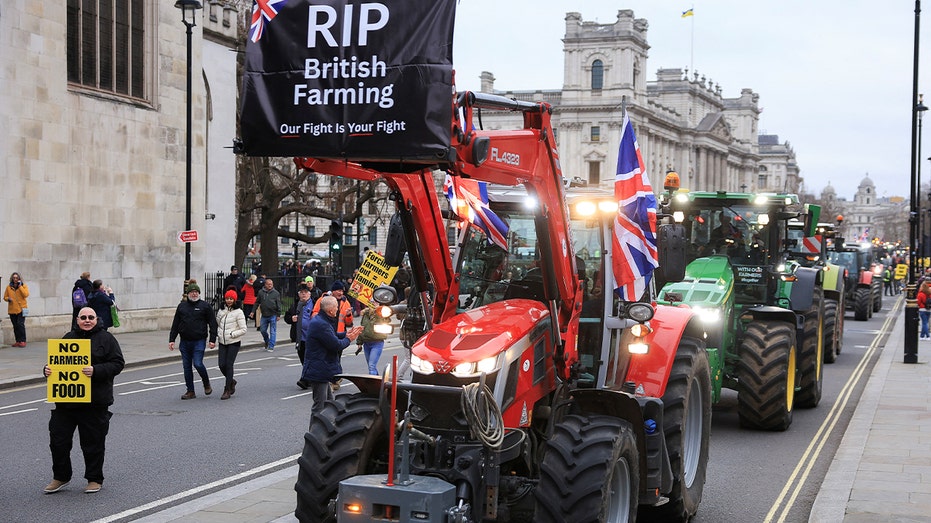 Hundreds of tractors block central London streets as farmers protest tax change