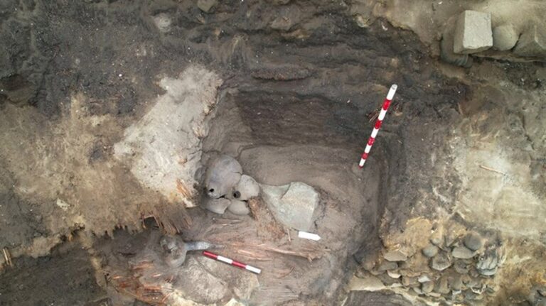 Archaeologists unearth body of 5,000 year-old woman in former dump