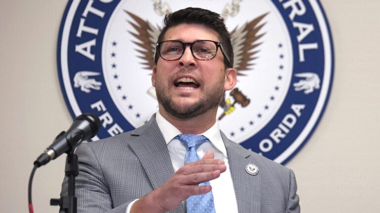 Florida attorney general held in contempt after challenging court's block on immigration law