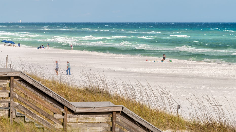 Police reveal contents of mysterious black packages that washed up on pristine Florida beach