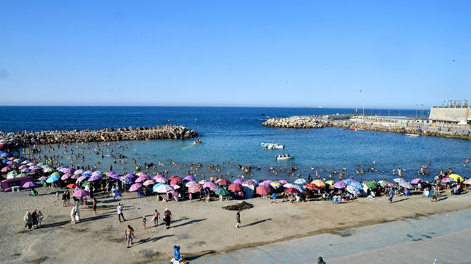 Beach town bans men's too-short swim trunks, sparking debate and rule flipflop
