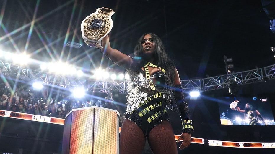 Naomi leaves Evolution as women's world champion after cashing in Money in the Bank contract