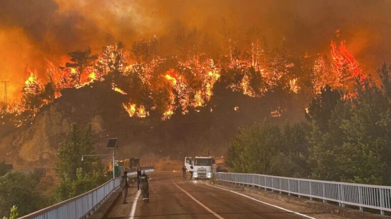 1,700 evacuated, firefighter dead as Turkey wildfires tear through major city