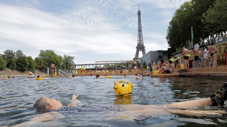 Once-polluted Paris river reopens for public swimming after Olympics rush to clean it up