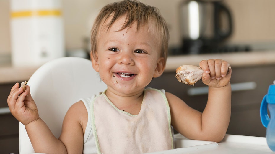 Doctors divided over new diet trend that has babies licking butter and gumming ribeye steak