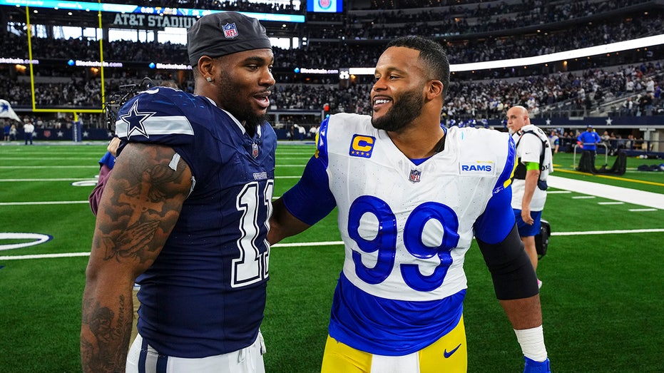 Micah Parsons hints at move to Rams in latest contract dispute twist, and Aaron Donald teases NFL return