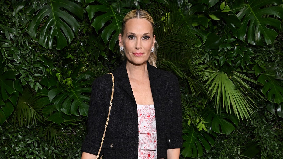 Molly Sims wraps up summer in style with purple bikini moments