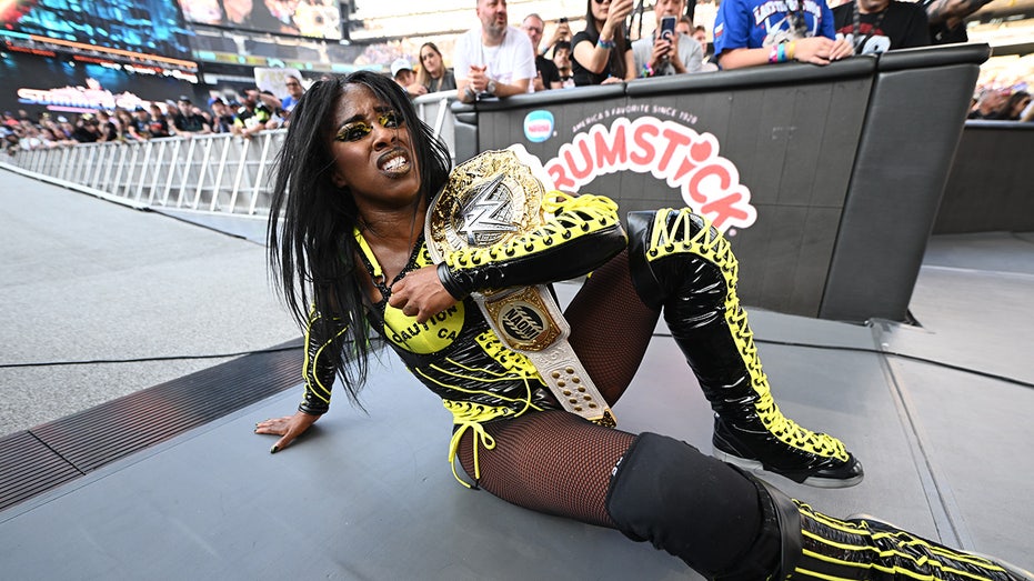 Naomi steals SummerSlam victory from Rhea Ripley, Iyo Sky to retain Women's World Championship