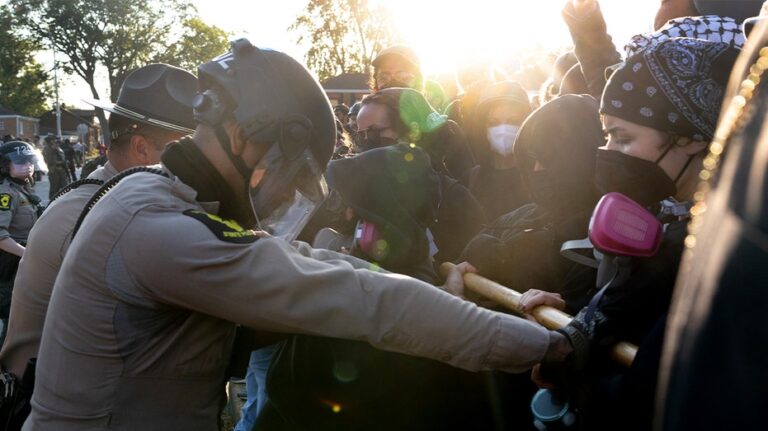 DHS says ICE agents in Chicago suburb 'boxed in by 10 cars' as tensions escalate