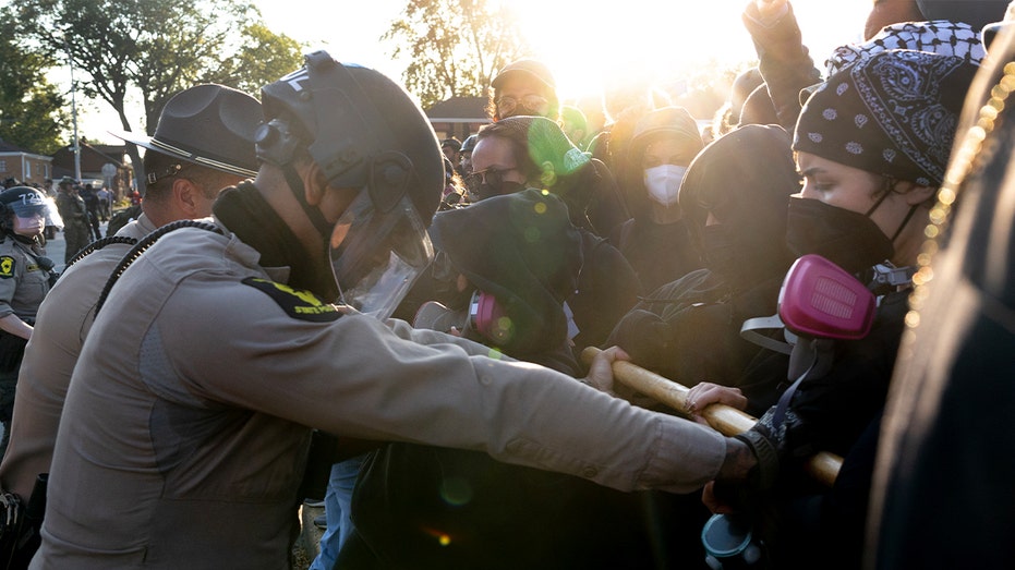 DHS says ICE agents in Chicago suburb 'boxed in by 10 cars' as tensions escalate