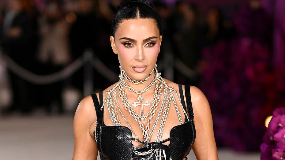 Kim Kardashian ditches face mask for sheer braided dress at exclusive London after-party