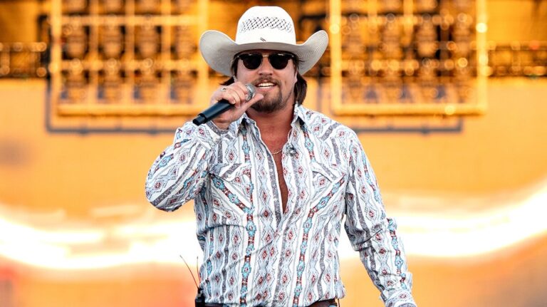 Country star Gavin Adcock falls off stage during concert