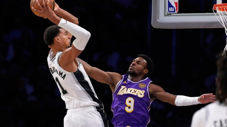 Spurs' Victor Wembanyama dunks over Lakers' Bronny James
