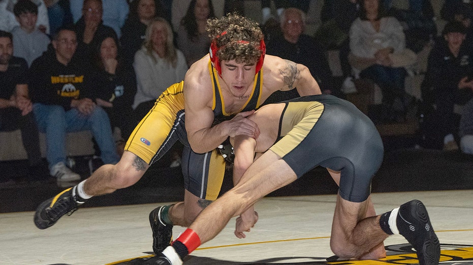 New Jersey wrestling champion and dad reach plea deal in tournament brawl case