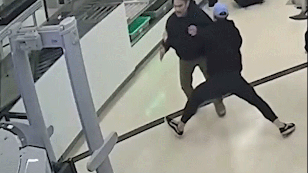 Video shows airport bystander body slamming TSA breach suspect in split-second takedown