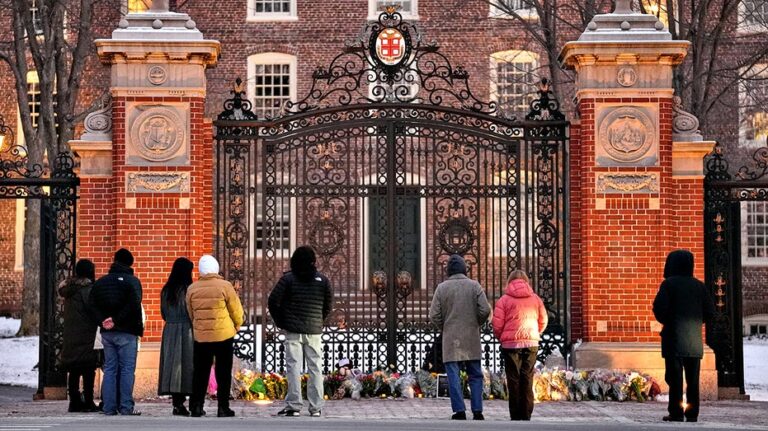 Students return to Brown University amid questions over security policies that enabled mass shooting