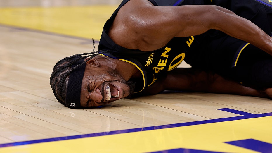 Warriors star Jimmy Butler's season over after devastating knee injury against Heat