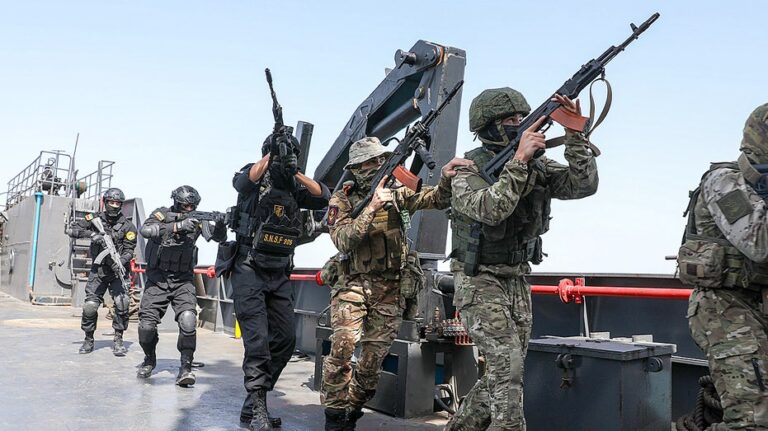 Iran possibly repositions strike drones amid Russia drills in Strait, expert says