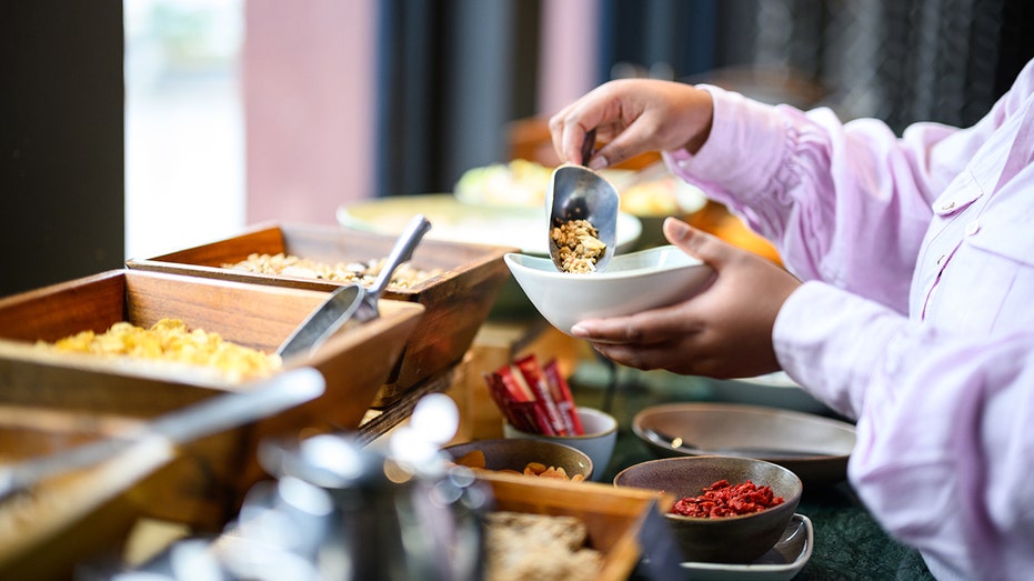 Hotel buffet crashers caught on camera loading up plates, walking out without paying